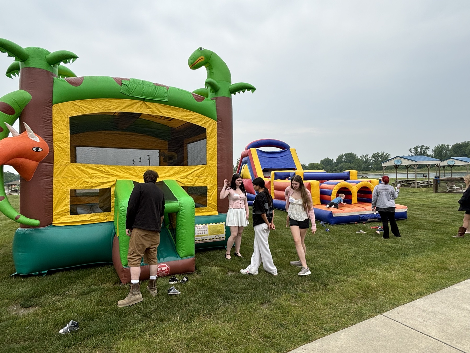 Bounce houses on the Lake Callis lawn